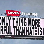 A billboard with the line, The only thing more powerful than hate is love.