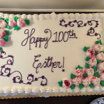 Joy’s mother, Esther Rowland, smiling at her 100th birthday celebration.