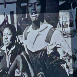 Sam Nzima's historical photo of Mbuyisa Makhubu carrying Hector Pieterson alongside Antoinette.